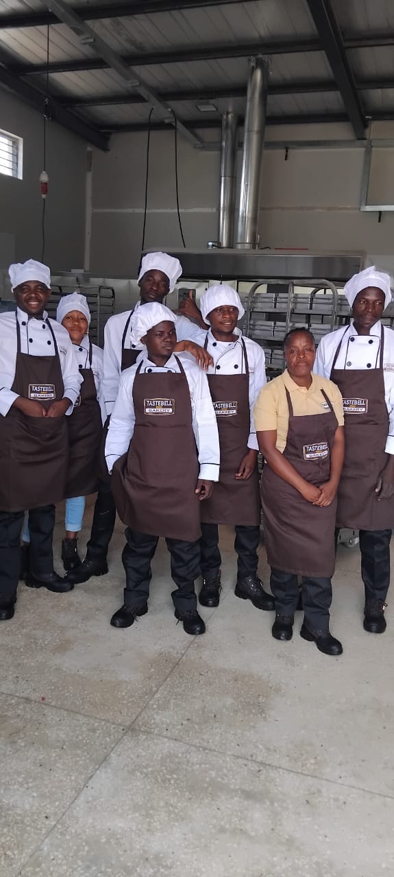 Tastebell bakers and staff in the production area